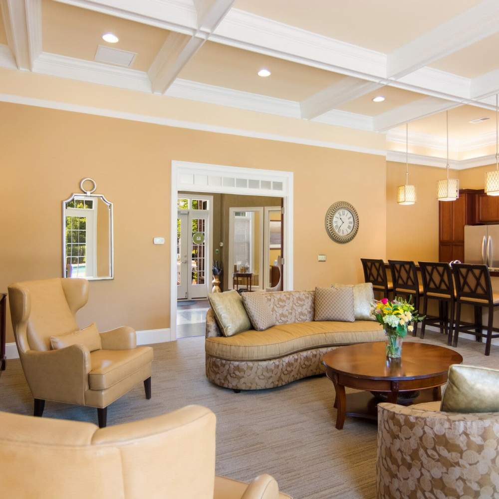 Lounge area with seating and kitchen bar at Waverly Place in Louisa, Virginia