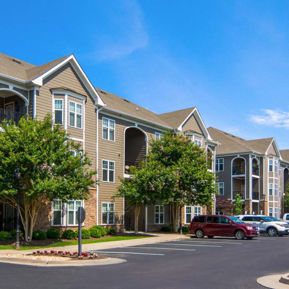Apartment building exterior with landscaped grounds at Waverly Place in Louisa, Virginia