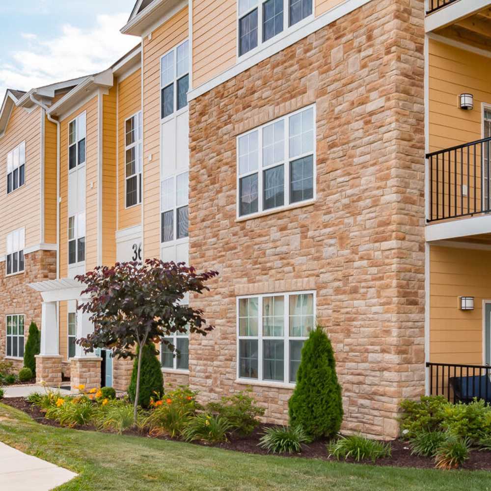 Community building with grass bed  at The Apartments at Goose Creek in Fishersville, Virginia