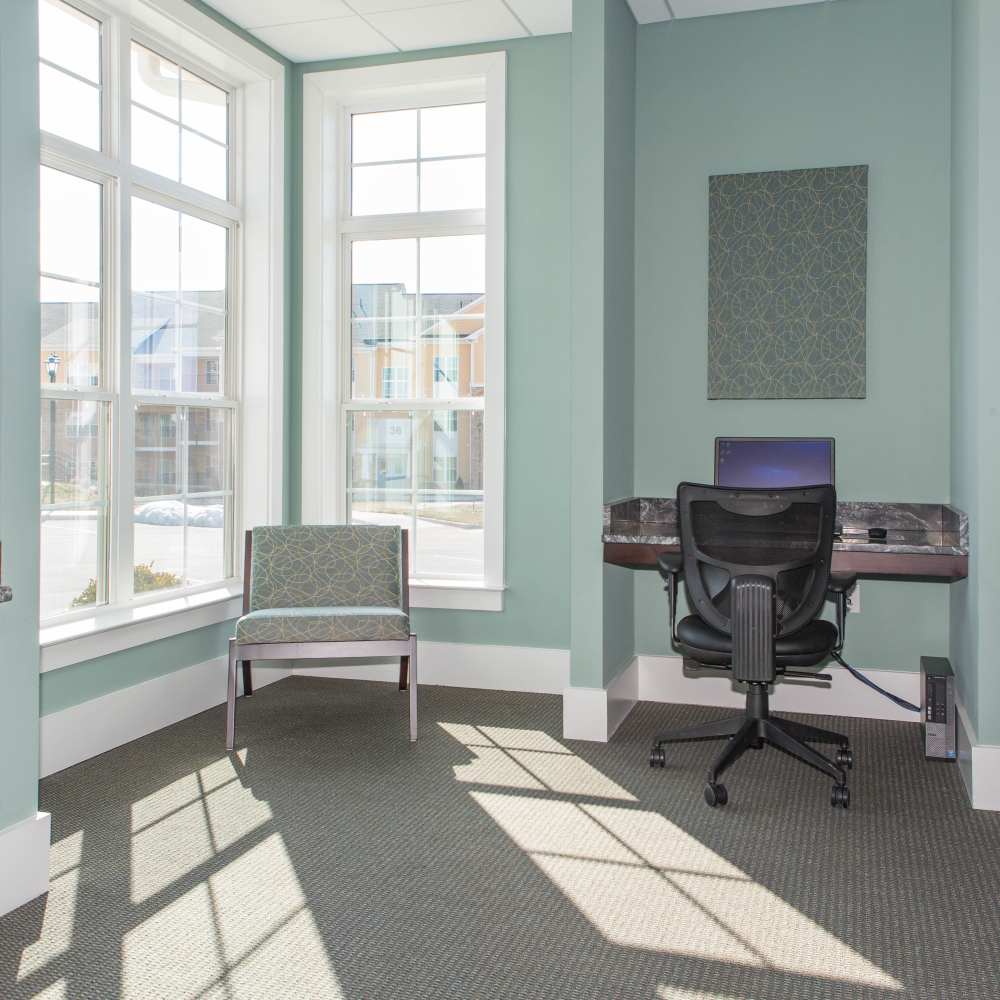 Business area with computers at The Apartments at Goose Creek in Fishersville, Virginia