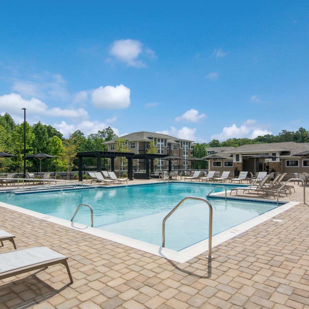 Resort-style swimming pool with lounge chairs at The Knoll at Stone View in Ruckersville, Virginia