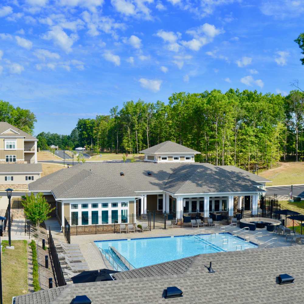 Resort-style pool with clubhouse at Stonegate at the Crossroads in Zion Crossroads, Virginia