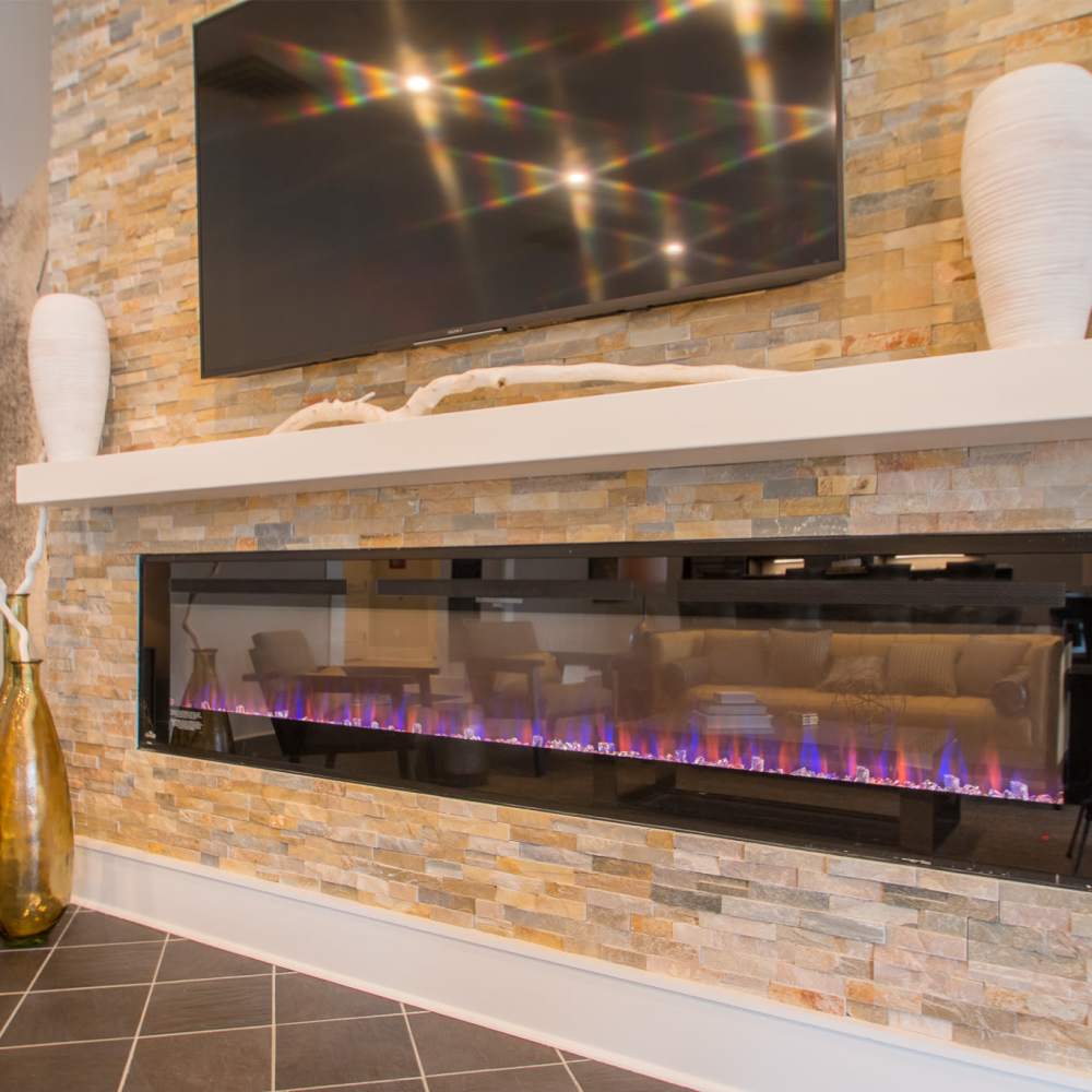 Modern fireplace with TV above at Stonegate at the Crossroads in Zion Crossroads, Virginia
