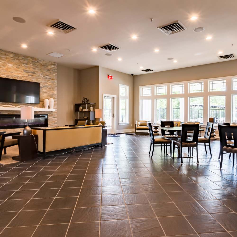 Clubhouse with seating and fireplace at Stonegate at the Crossroads in Zion Crossroads, Virginia