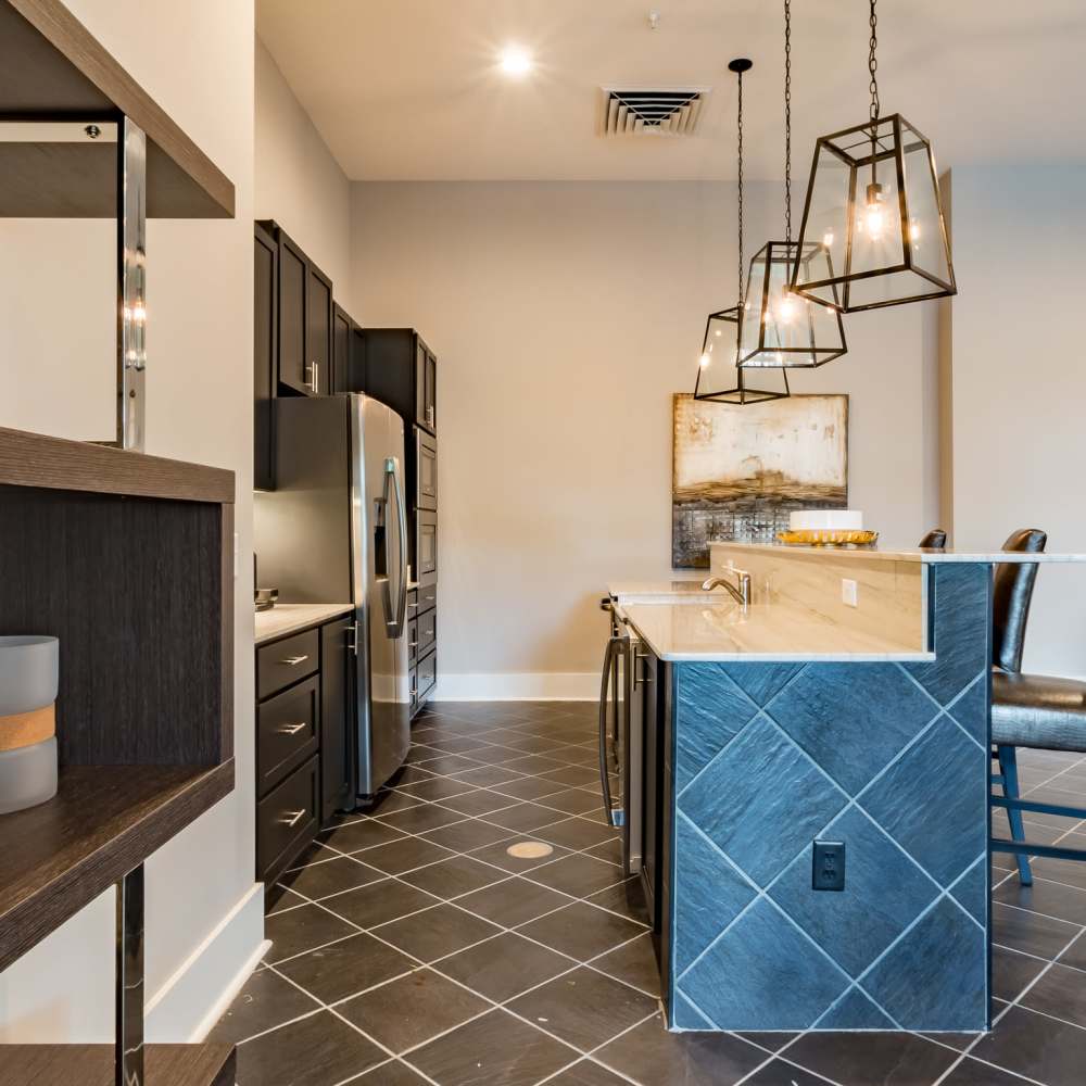 Modern kitchen with granite countertops at Stonegate at the Crossroads in Zion Crossroads, Virginia