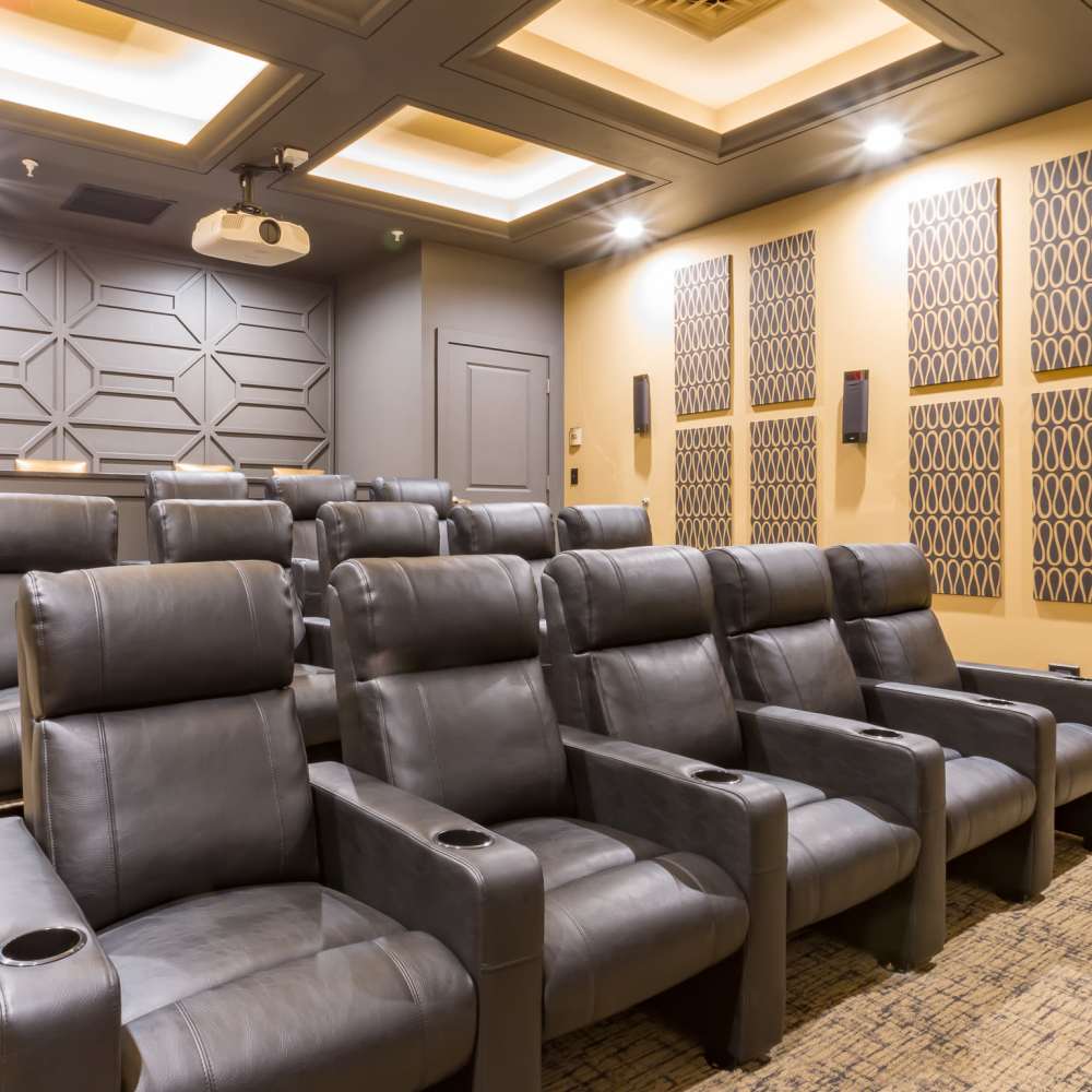 Theater seating with leather recliners at Stonegate at the Crossroads in Zion Crossroads, Virginia