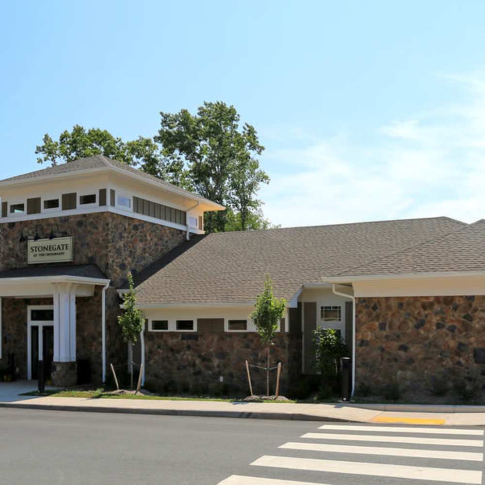 Clubhouse entrance with stone exterior at Stonegate at the Crossroads in Zion Crossroads, Virginia