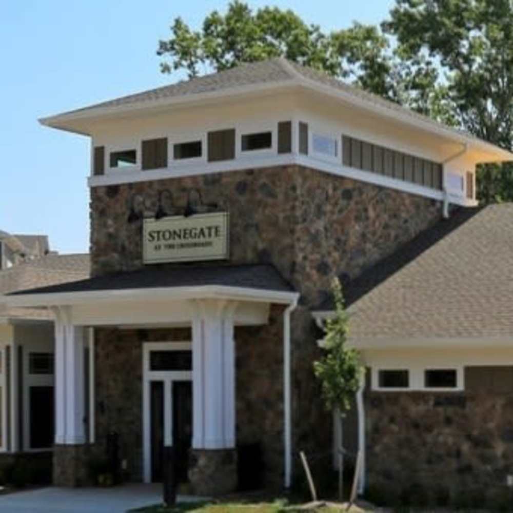 Clubhouse entrance with stone facade at Stonegate at the Crossroads in Zion Crossroads, Virginia