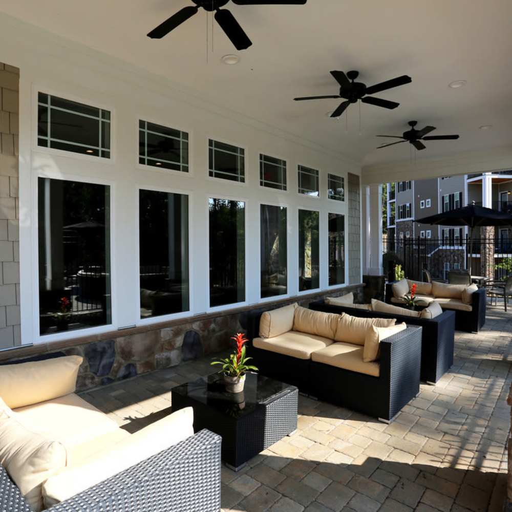 Lounge seating area with ceiling fans at Stonegate at the Crossroads in Zion Crossroads, Virginia