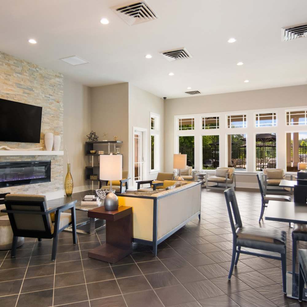 Clubhouse with seating and fireplace at Stonegate at the Crossroads in Zion Crossroads, Virginia