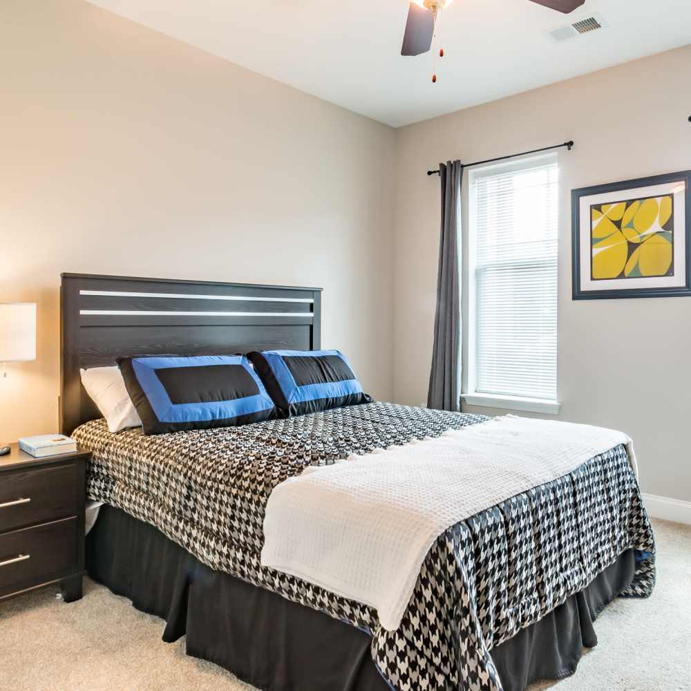 Cozy bedroom with king bed at Stonegate at the Crossroads in Zion Crossroads, Virginia