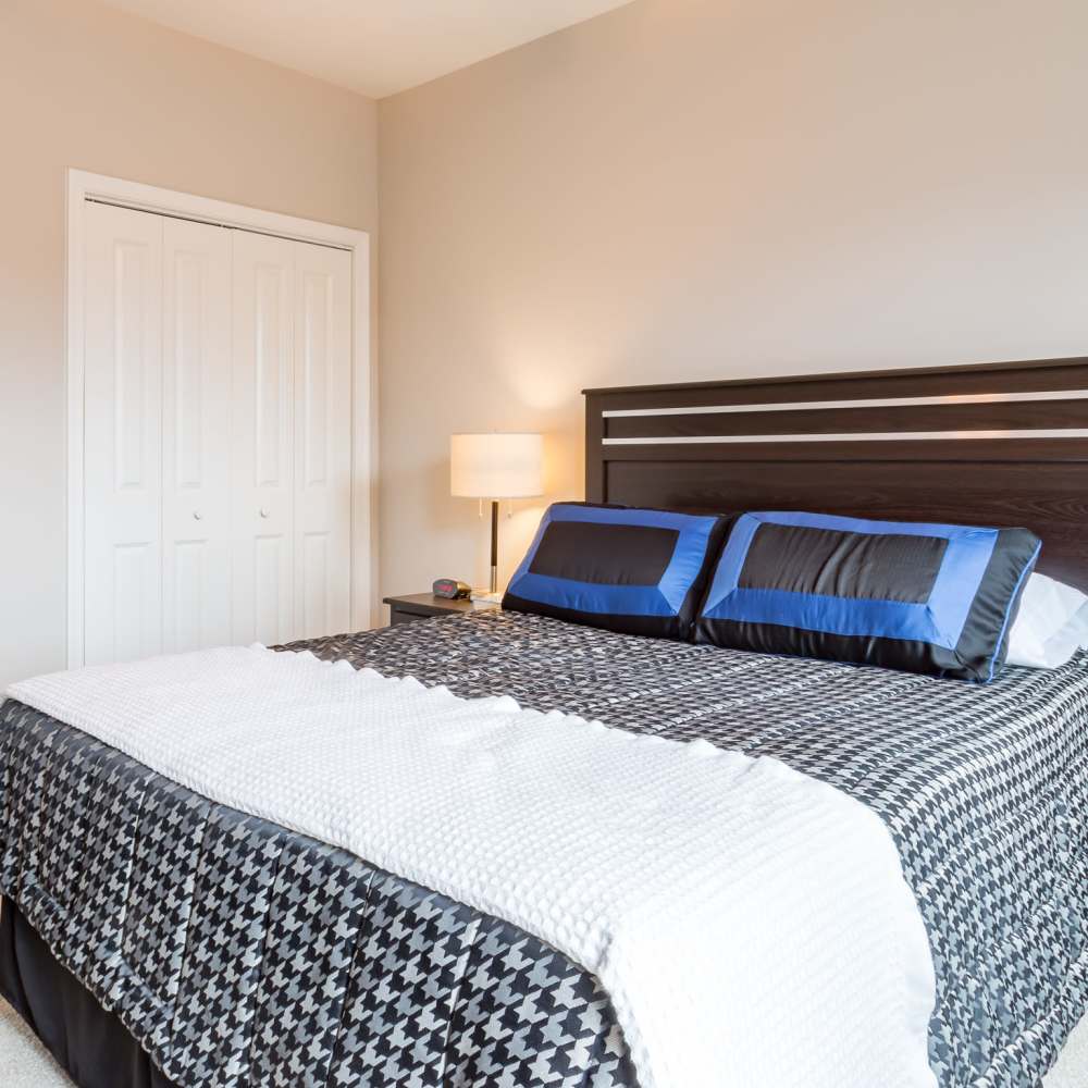 Bedroom with king bed and closet at Stonegate at the Crossroads in Zion Crossroads, Virginia