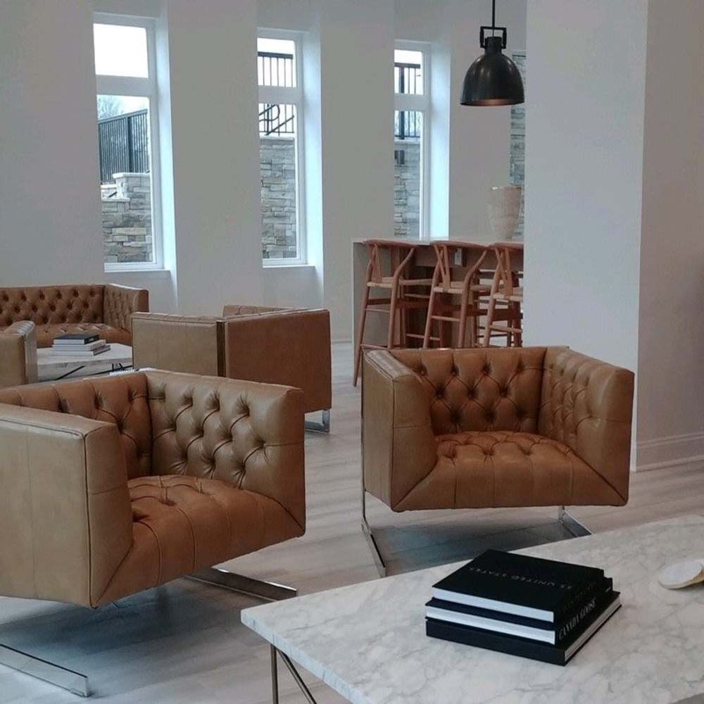 Comfortable armchairs in the community room at The Summit At Old Trail in Crozet, Virginia 