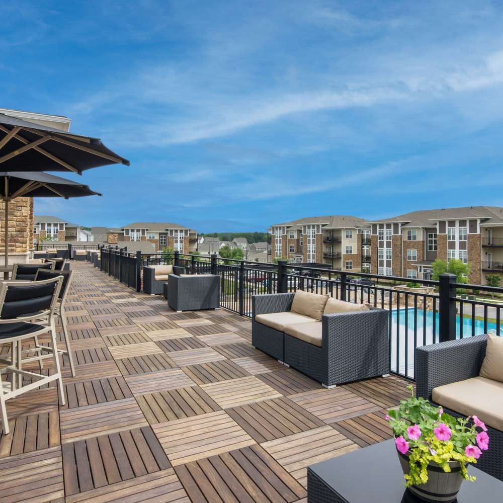 Clubhouse deck with seating at The Adams at Peppers Ferry in , Virginia