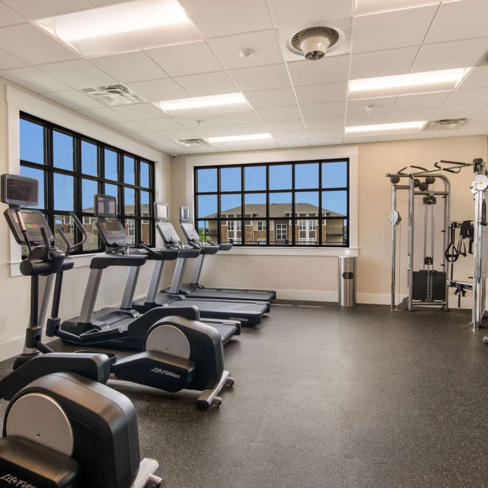 Fitness center with treadmills at The Adams at Peppers Ferry in Christiansburg, Virginia