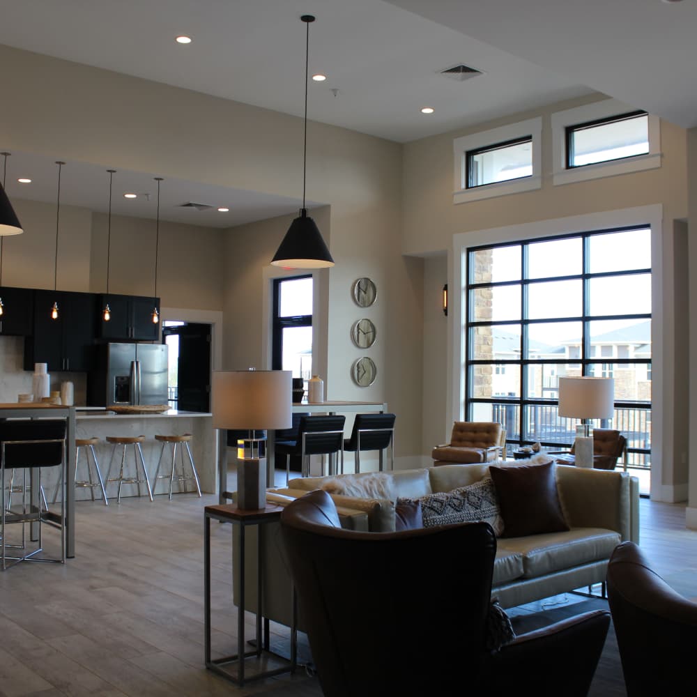 Lounge seating with view to clubhouse kitchen at The Adams at Peppers Ferry in Christiansburg, Virginia