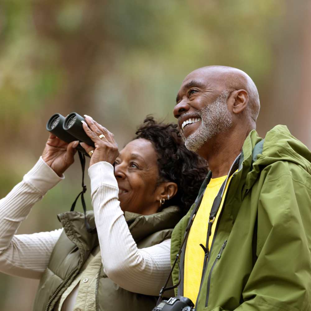 Couple enjoying nature together outdoors near Dr. Louis A. Venson Senior Lofts in Pittsburgh, Pennsylvania 