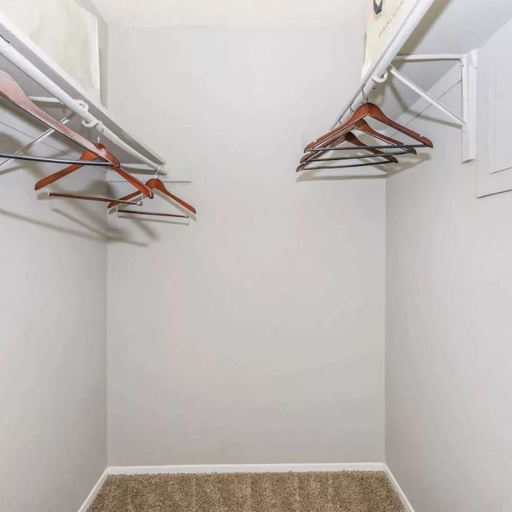 Walk-in closet at Barcelo Apartment Homes in San Antonio, Texas