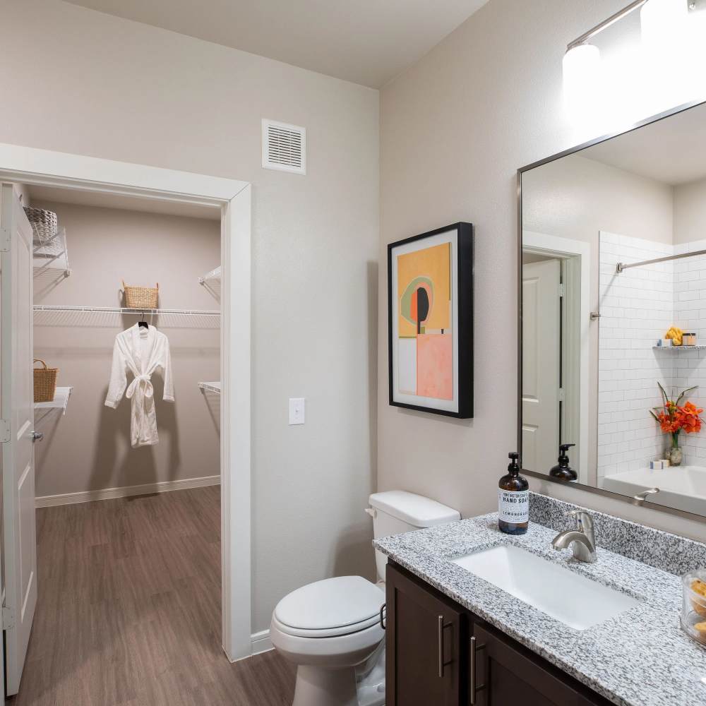 Granite countertops in modern bathroom at August Friendswood in Friendswood, Texas