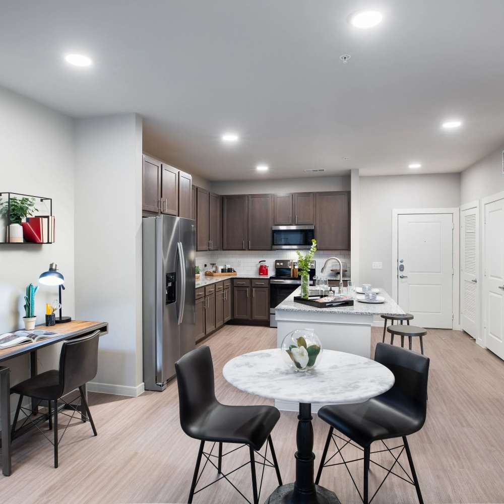 Granite countertops and stainless steel appliances at August Friendswood in Friendswood, Texas