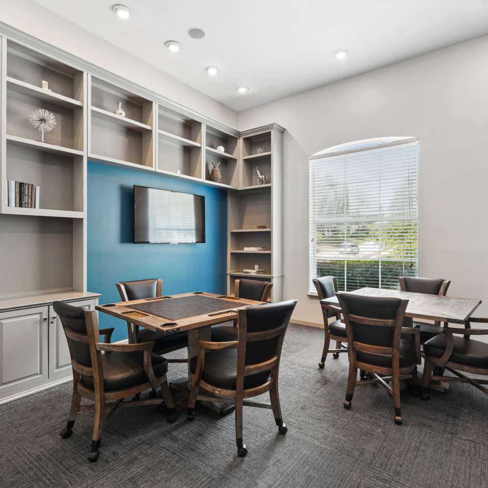 Seating in an entertainment area in the clubhouse at The Courts of Avalon in Pikesville, Maryland