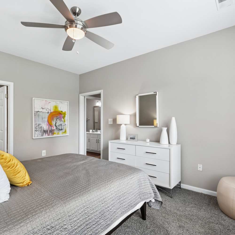 A large bedroom with a closet at The Courts of Avalon in Pikesville, Maryland