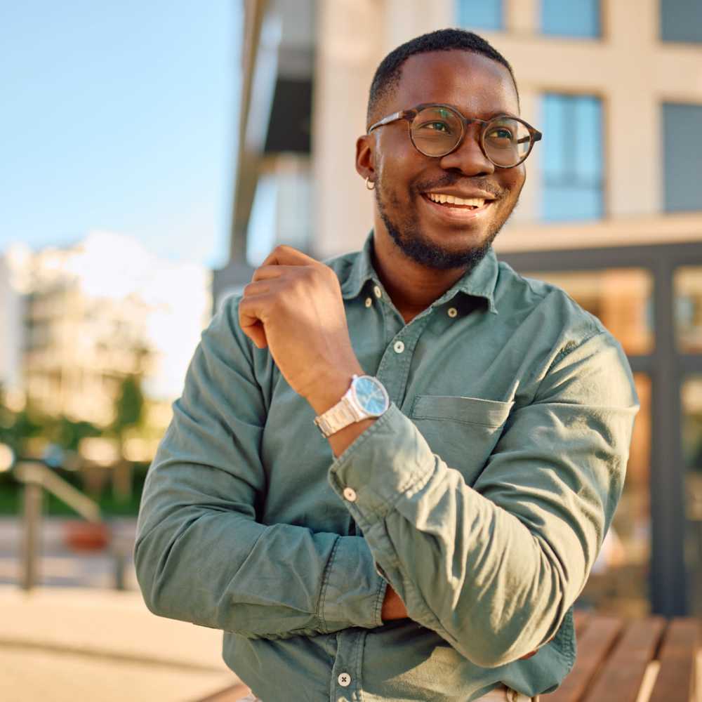 A smiling team member at Emerald Properties in San Lorenzo, California