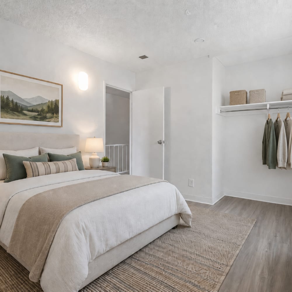 Staged bedroom featuring a large closet at San Juan Del Centro in Boulder, Colorado