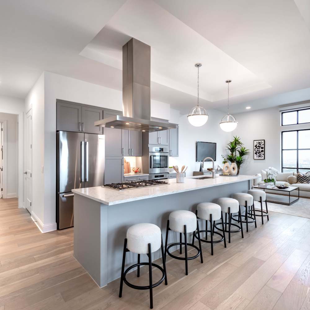 Modern kitchen with granite countertops at Novel Turtle Creek in Dallas, Texas
