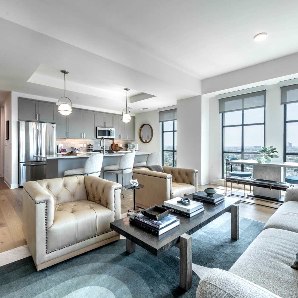 Modern open layout living area with stylish furniture at Novel Turtle Creek in Dallas, Texas