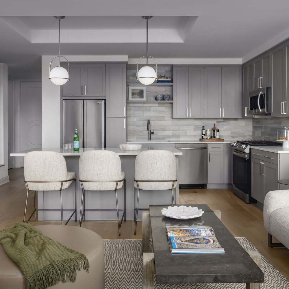 Modern kitchen with stainless steel appliances at Novel Turtle Creek in Dallas, Texas