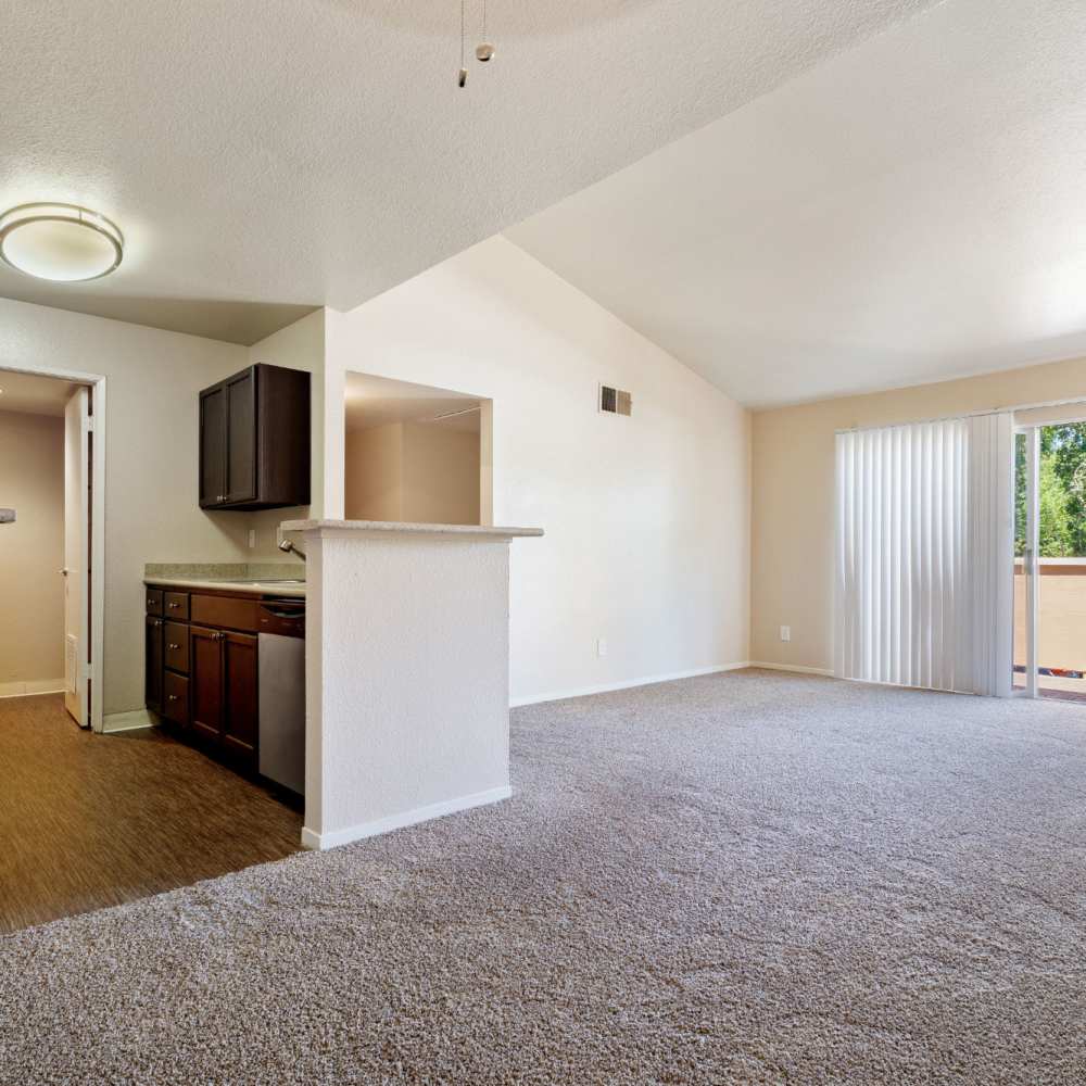 Bright living room and kitchen area in a home at Bridges at San Ramon in San Ramon, California