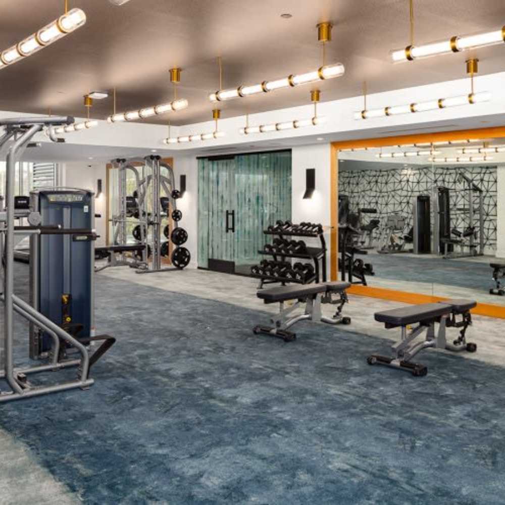 Weight benches and exercise equipment at Novel Midtown in Atlanta, Georgia