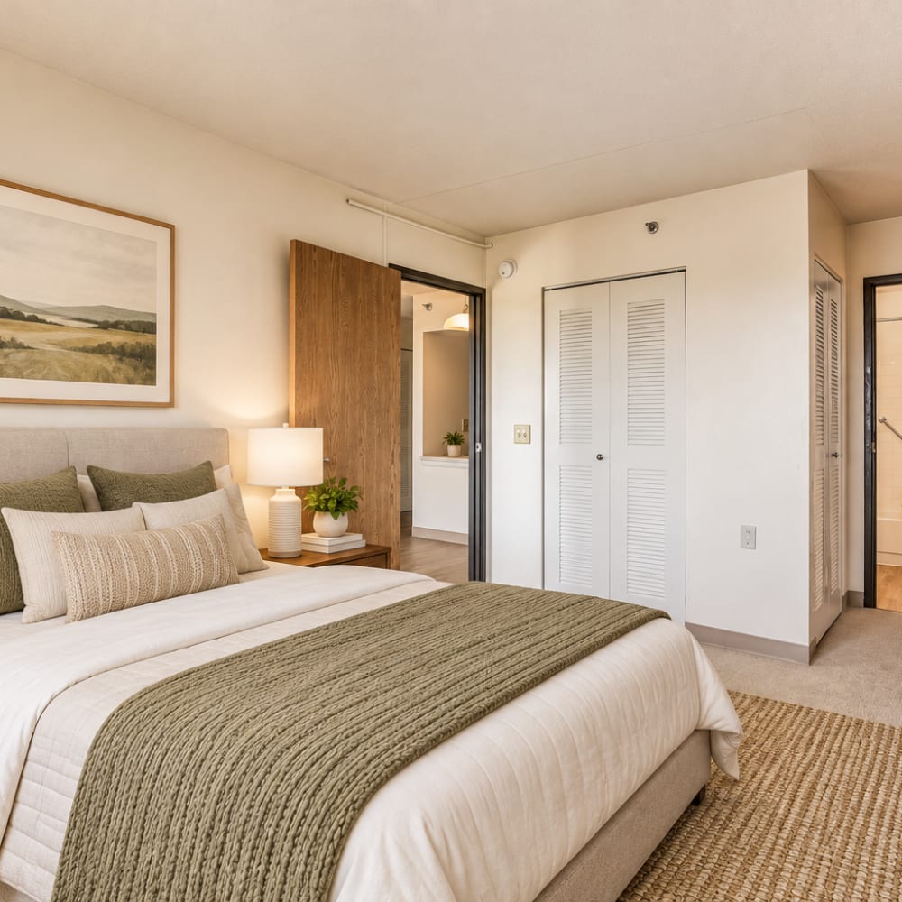 Unfurnished bedroom with access to bathroom at Village Center in Detroit, Michigan
