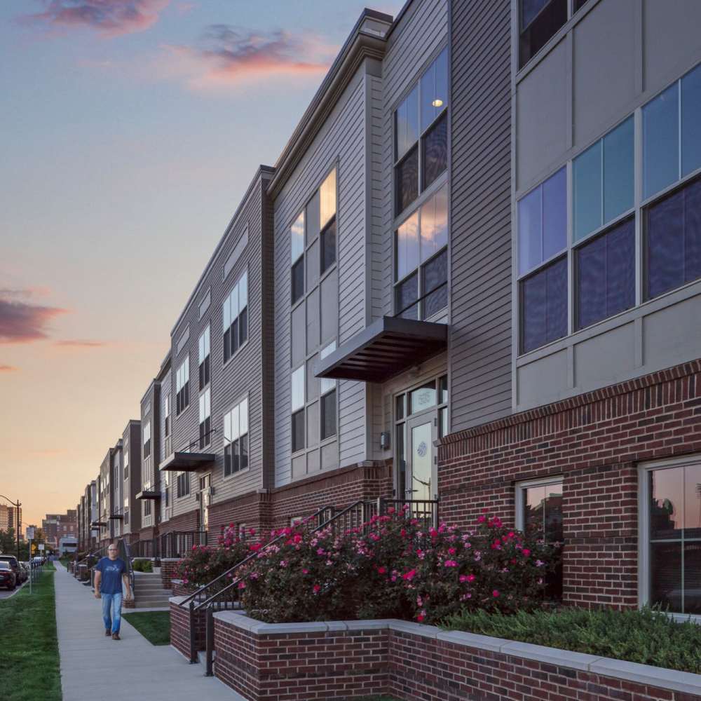 Flower beds next to the building at Water Street Apartments in Dayton, Ohio