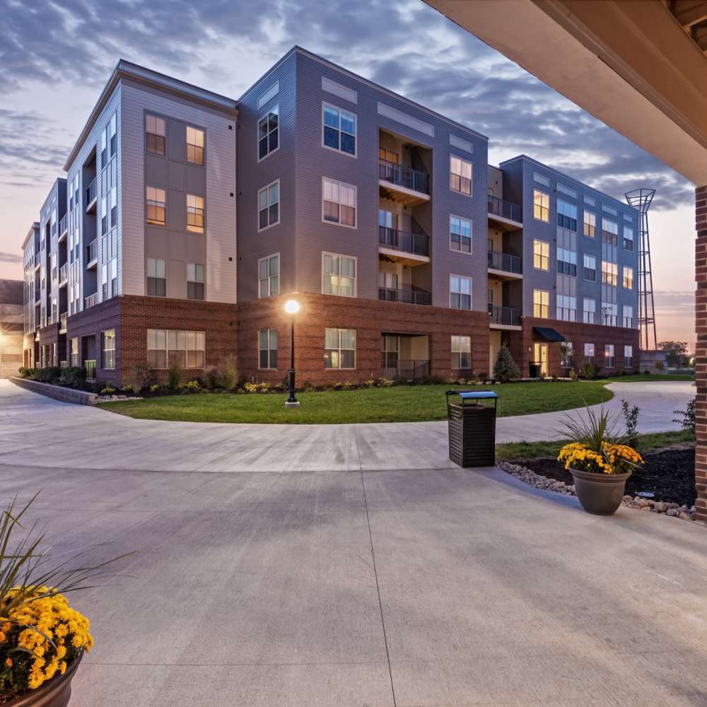 Walkway between buildings at dusk at Water Street Apartments in Dayton, Ohio
