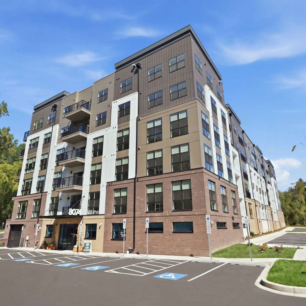 Exterior of building and community entrance at The Residences at Patapsco in Ellicott City, Maryland