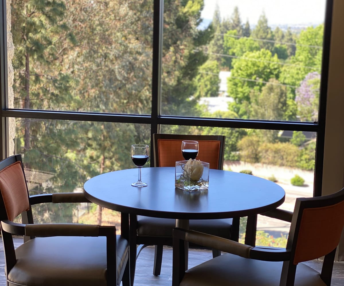 Table by the window at Meridian at Laguna Hills in Laguna Hills, California