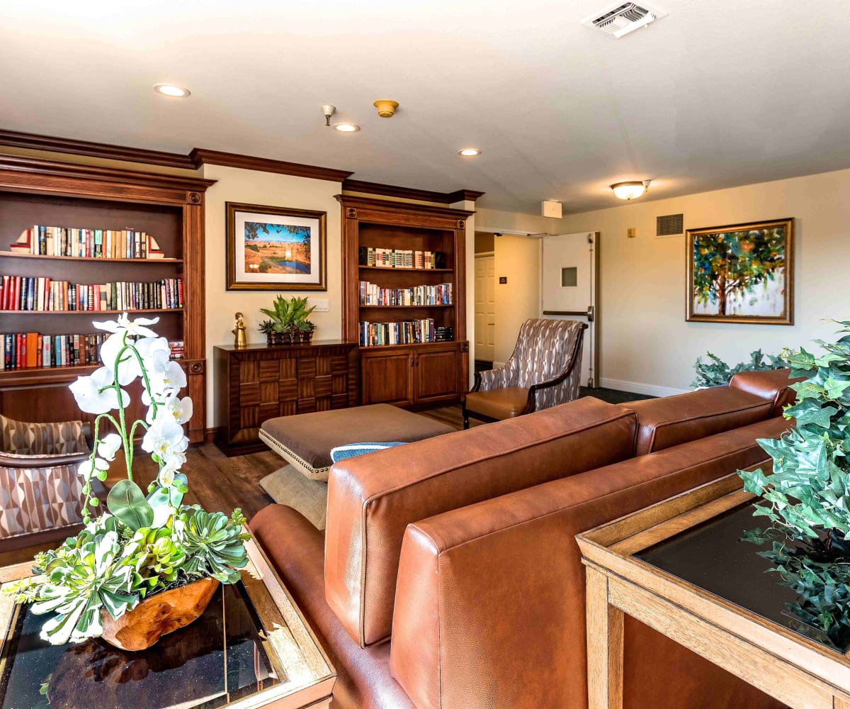 Community library and lounge at Pacifica Senior Living San Leandro in San Leandro, California