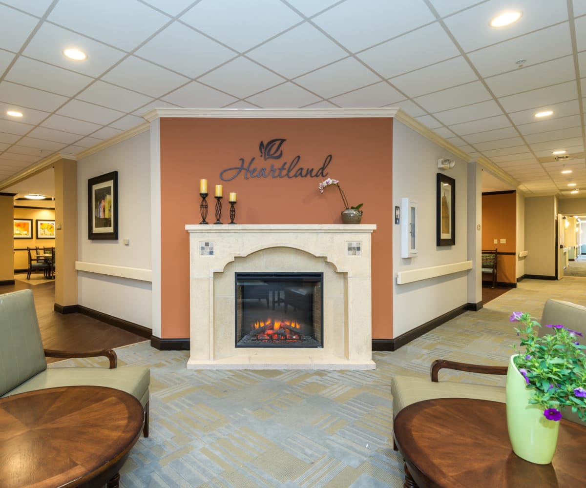 Lobby area with fireplace at Pacifica Senior Living Santa Fe in Santa Fe, New Mexico