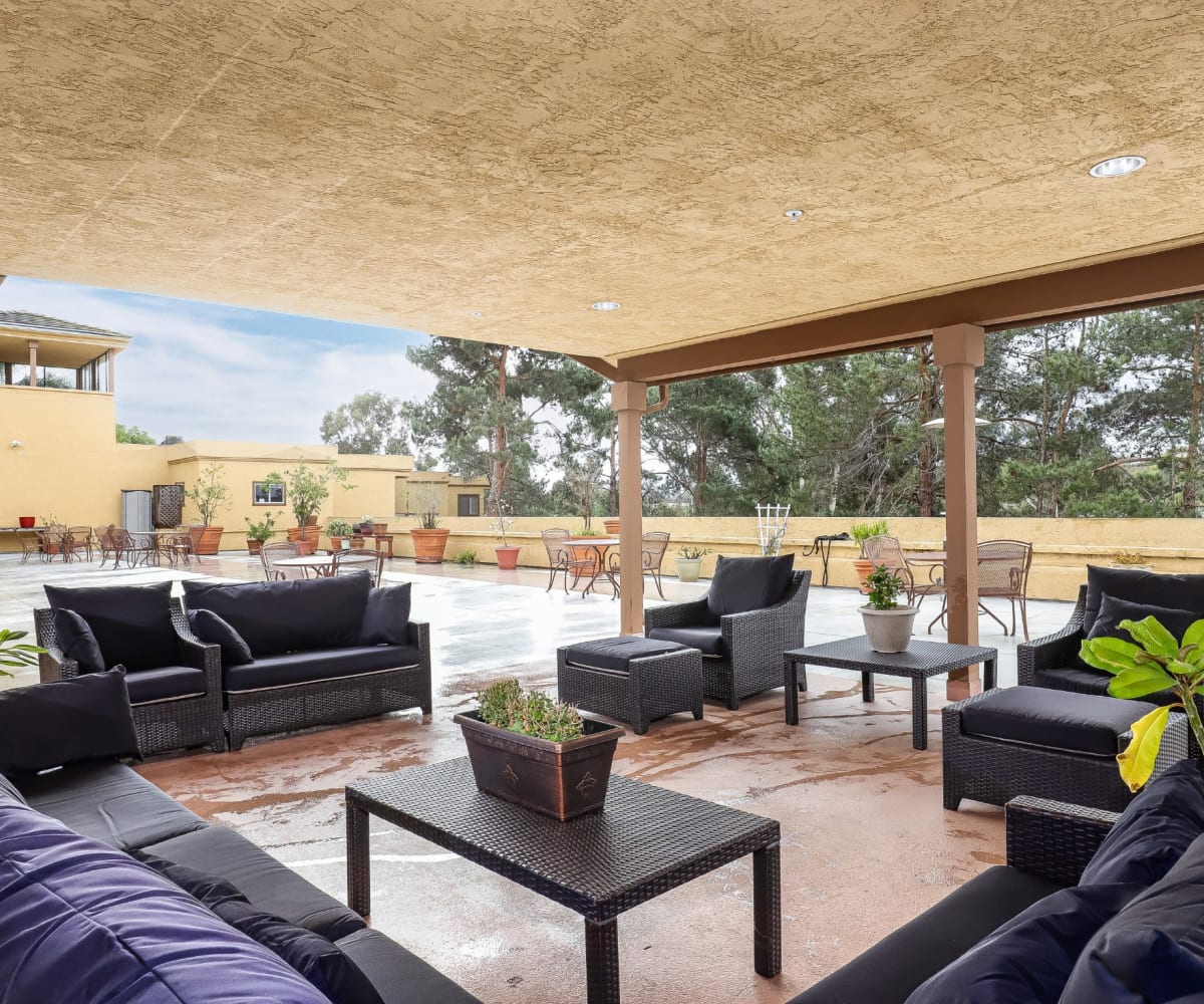 Outdoor wicker patio furniture at Pacifica Senior Living Poway in Poway, California