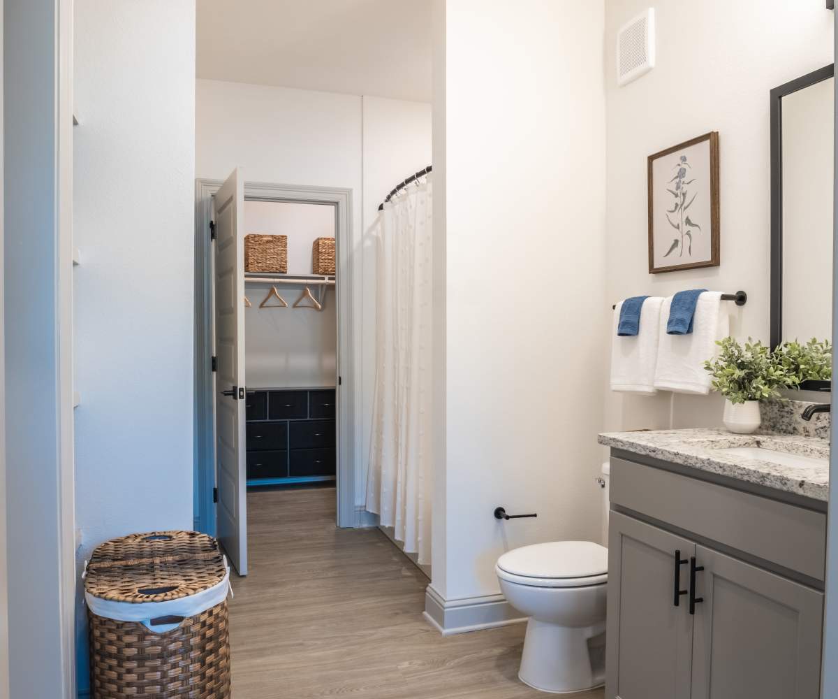 Bathroom with Ample Storage at The Waters at Freeport in Freeport, Florida