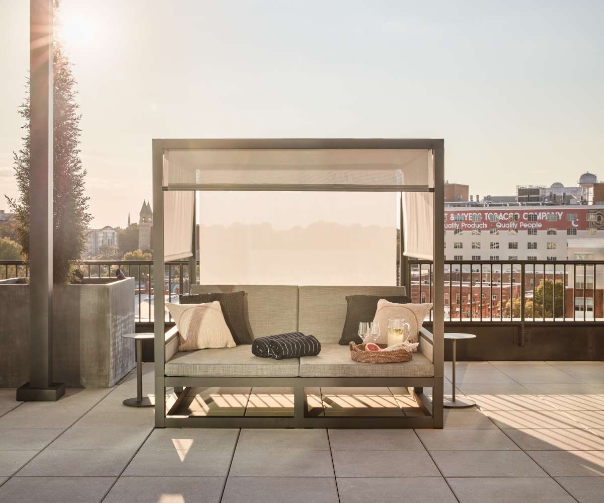 Cabana by the pool at dusk at The Novus Apartments in Durham, North Carolina