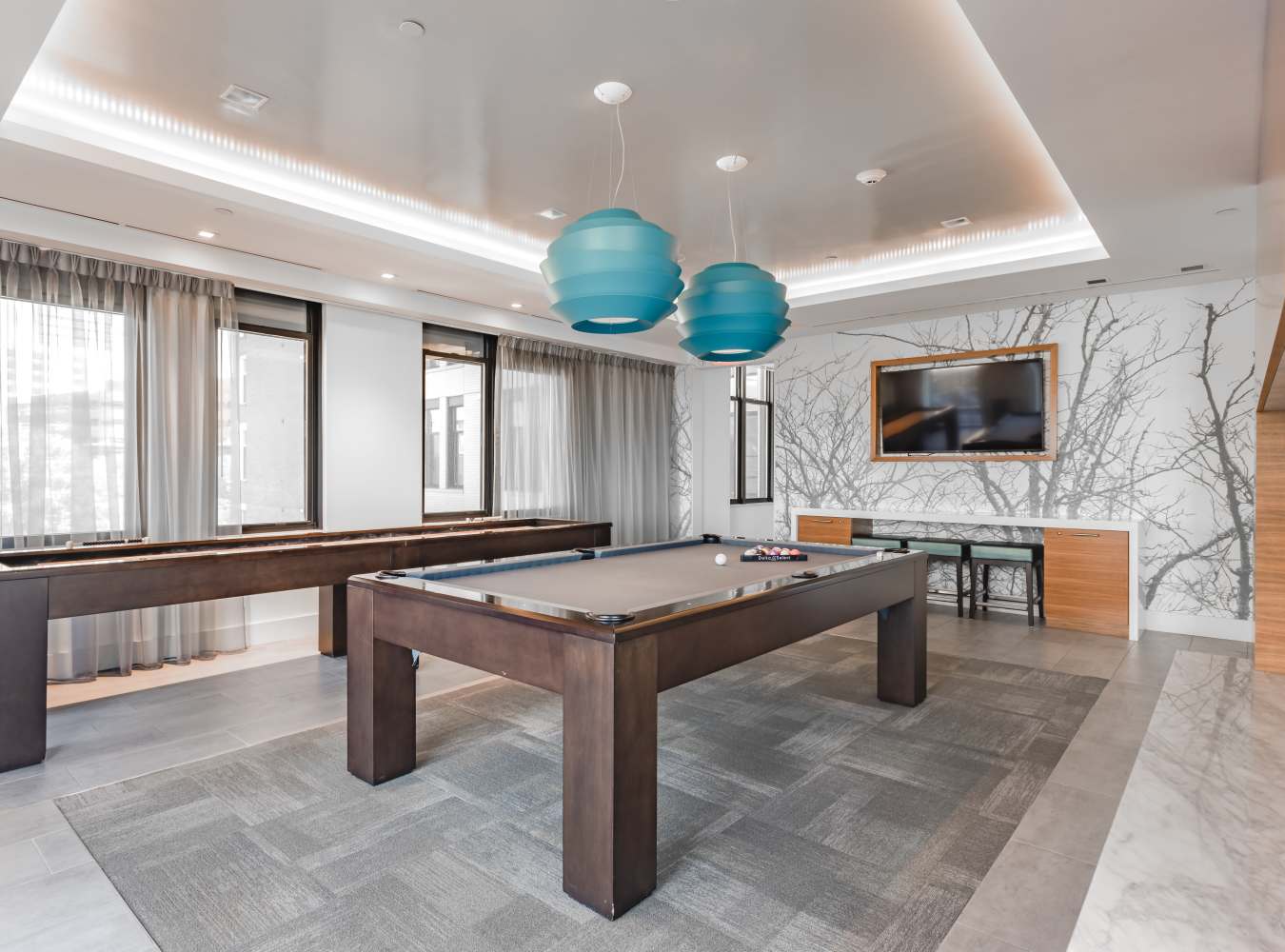 Game room with pool table at Solaire 7077 Woodmont in Bethesda, Maryland