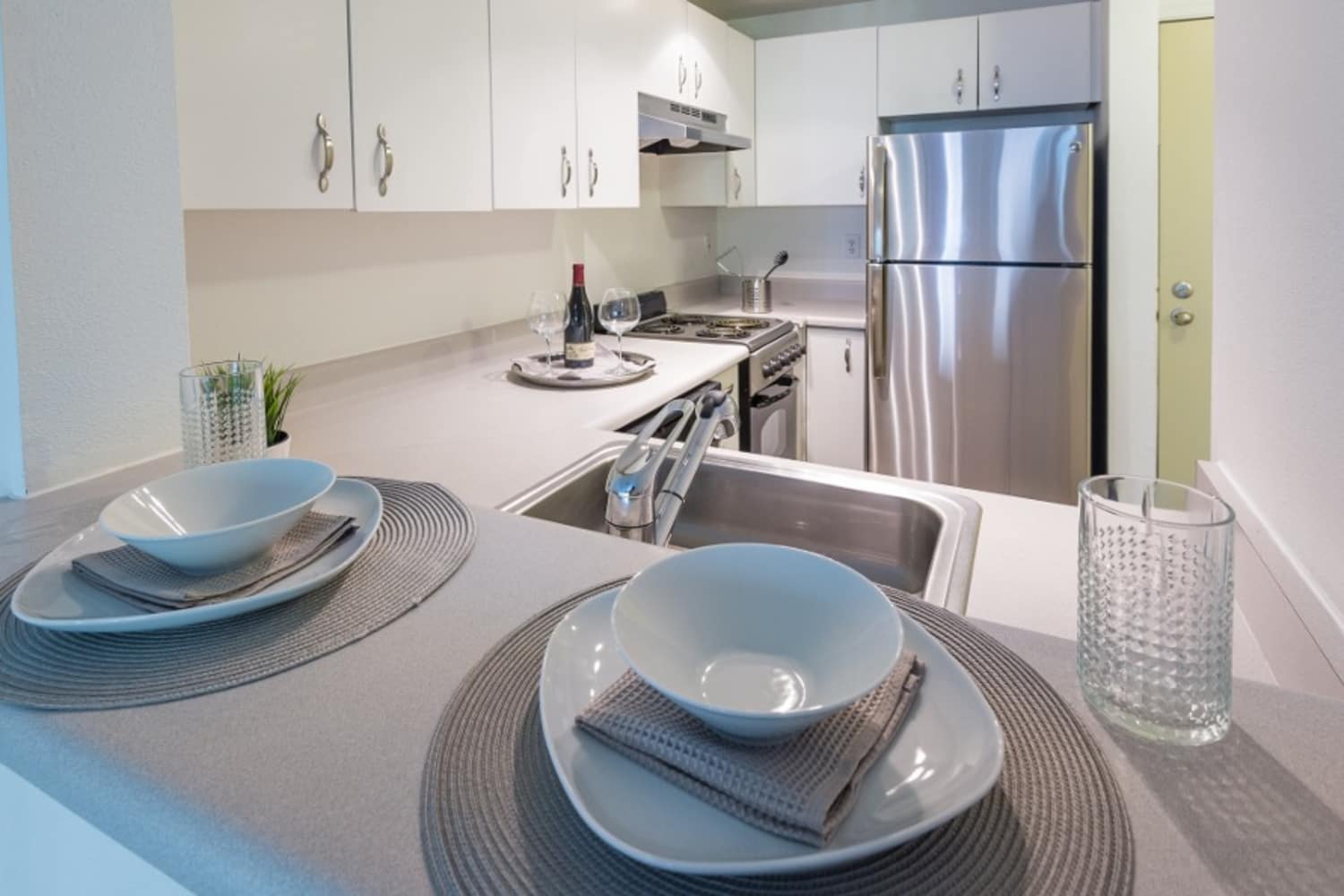 Apartment kitchen at Metropolitan Park Apartments in Seattle, Washington