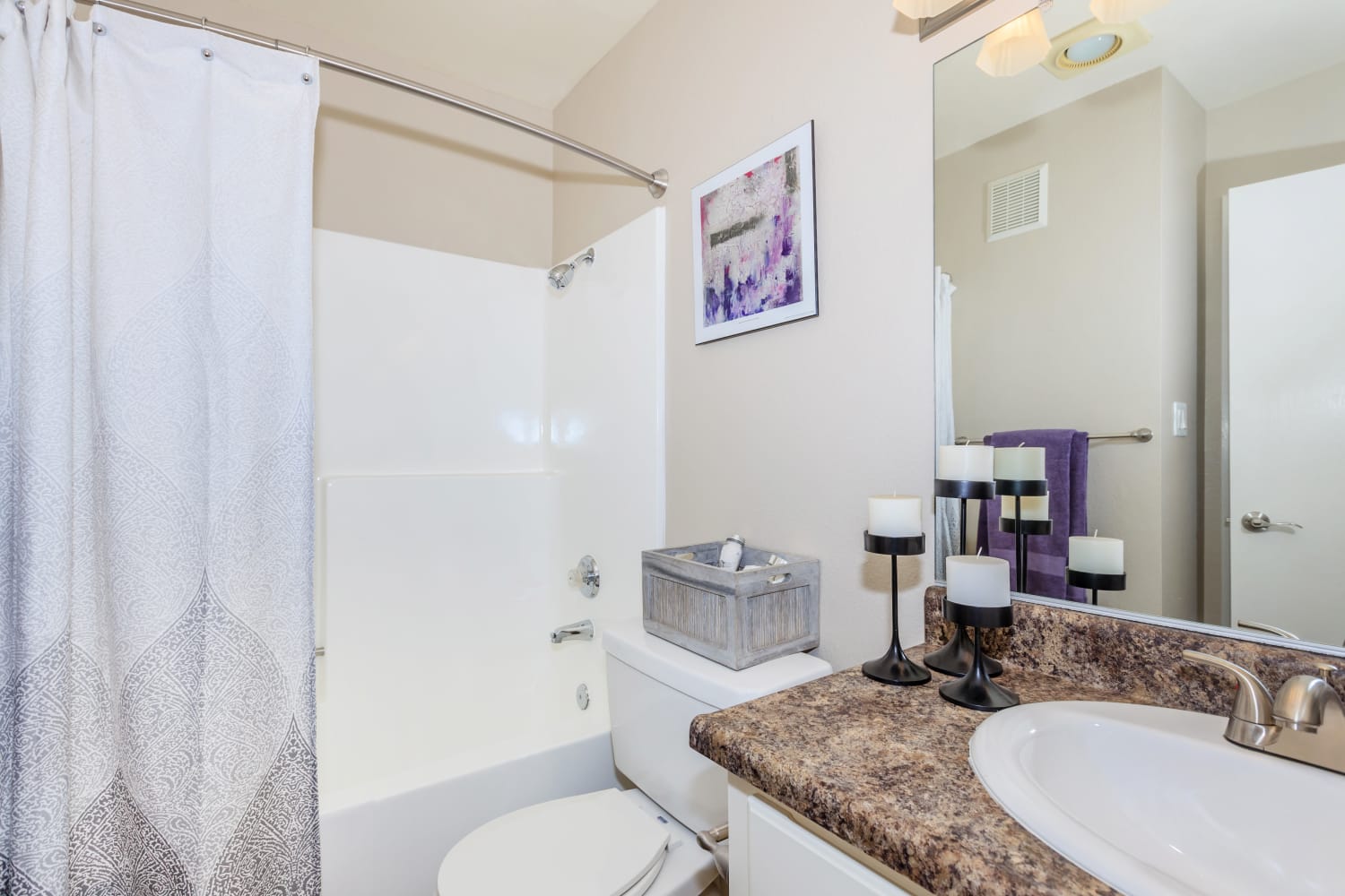 Clean and modern bathrooms at Parcwood Apartments in Corona, California