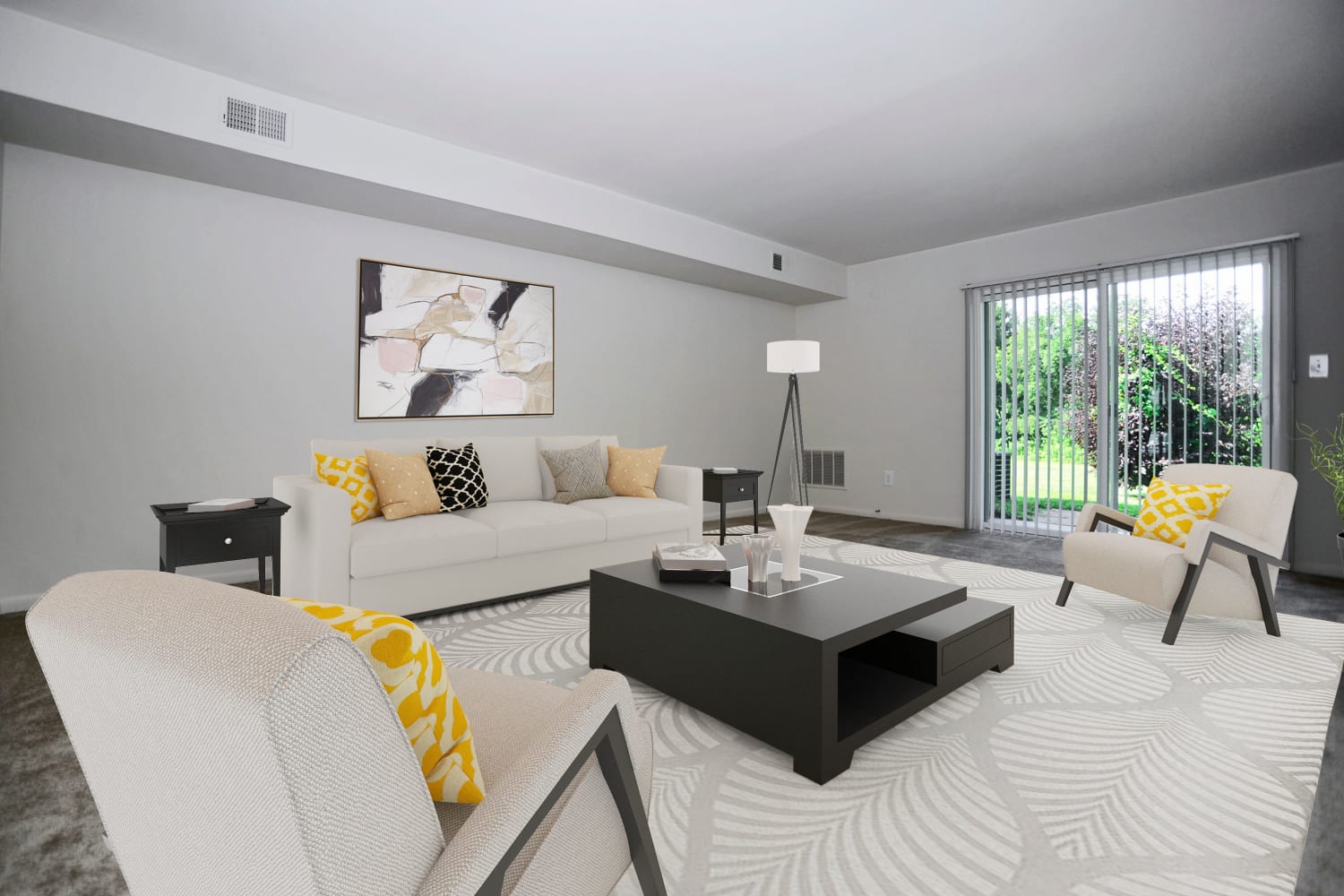 Beautiful model living room opening onto a private patio at The Fairways Apartment Homes in Blackwood, New Jersey
