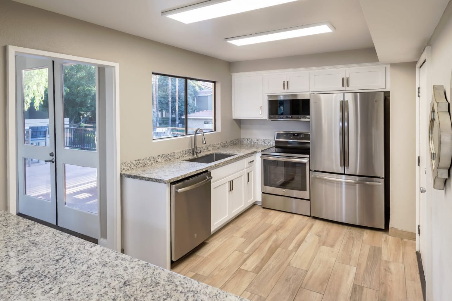 Enjoy a large updated kitchen at Parcwood Apartments in Corona, California