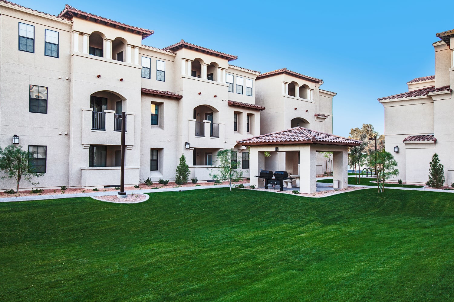 Enjoy lush, green grass outside of San Marquis in Tempe, Arizona