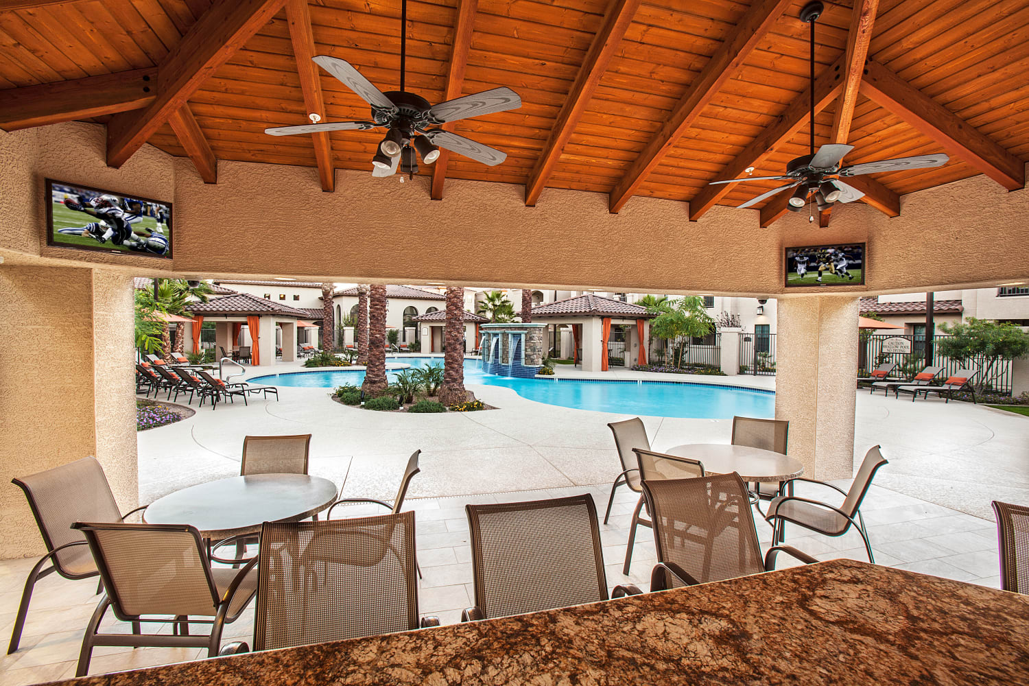 Enjoy televisions in the poolside clubhouse at San Marquis in Tempe, Arizona